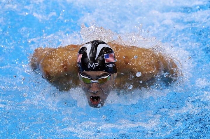 Michael Phelps takes part in the men's 200m individual medley