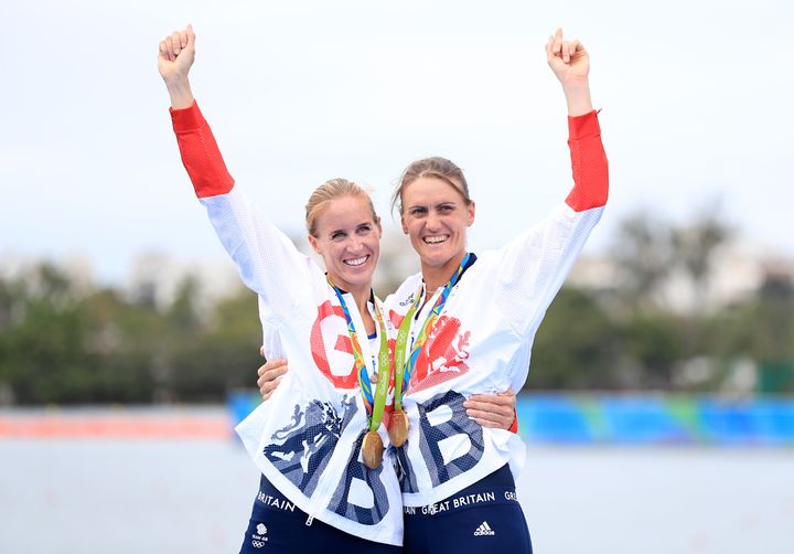 Helen Glover (left) and Heather Stanning celebrate winning gold in the Women's Pair Final at The Lagoa Stadium