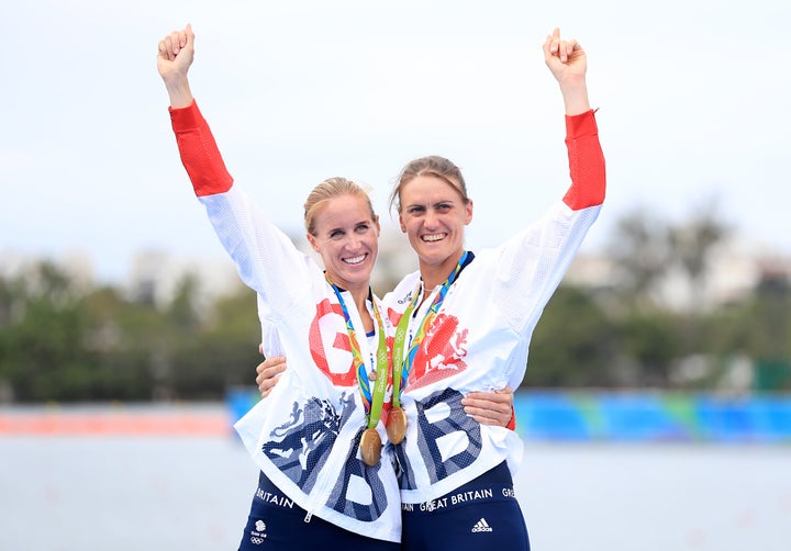 Helen Glover (left) and Heather Stanning celebrate winning gold in the Women's Pair Final at The Lagoa Stadium