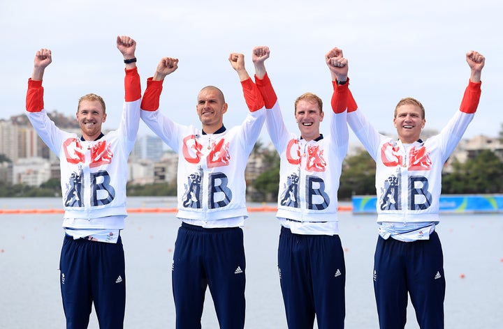 (left to right) Team GB's Alex Gregory, Mohamed Sbihi, George Nash and Constantine Louloudis celebrating winning the gold medal in the Men's Four