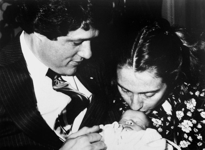Bill and Hillary Clinton with baby Chelsea in 1980.