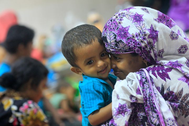 A mother plays with her thirteen-month old child Neerob, who is suffering from diarrhoea, at the International Centre for Diarrhoeal Disease & Research (ICDDRB), in Dhaka April 6, 2012.