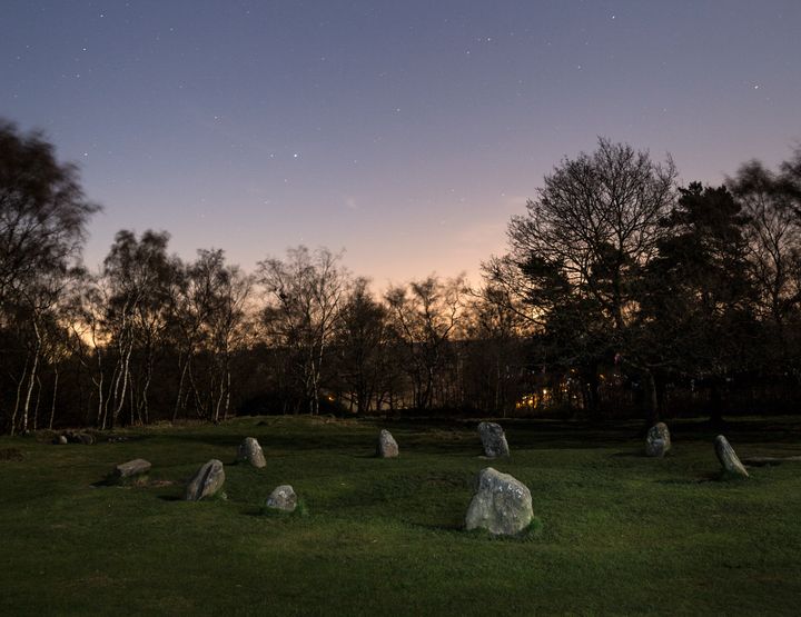 "Nine Ladies," a Bronze Age stone circle located in Derbyshire, England, is featured in Jack Pidduck's "Divination" photo series.