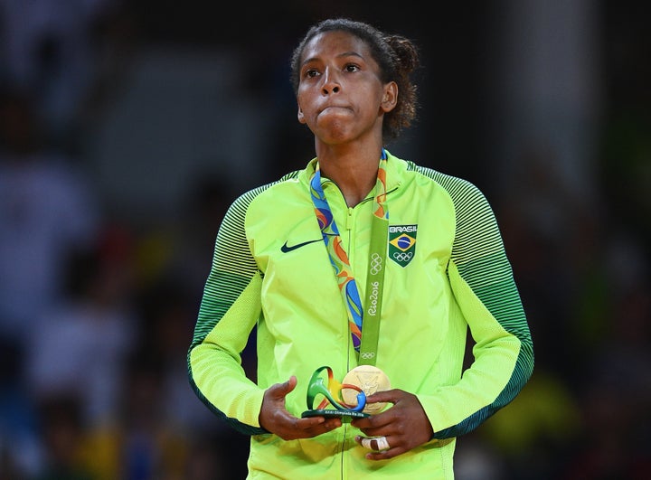 Rafaela Silva of Brazil celebrates after winning the gold medal in the Women's -57 kg Final - Gold Medal Contest on Day 3 of the Rio 2016 Olympic Games.