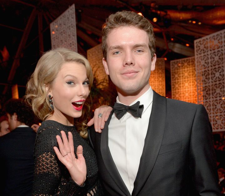 Singer Taylor Swift (L) and Austin Swift at The Beverly Hilton Hotel on Jan. 12, 2014 in Beverly Hills, CA.