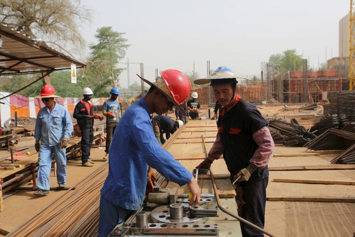 Chinese and Nigerien construction workers in Niamey, Niger, on February 22, 2016.