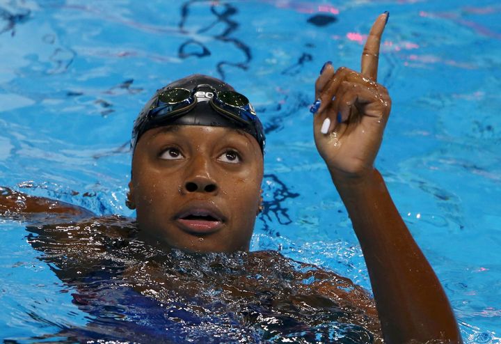 11/08/2016. Simone Manuel (USA) of USA reacts after winning the gold and setting a new Olympic record.