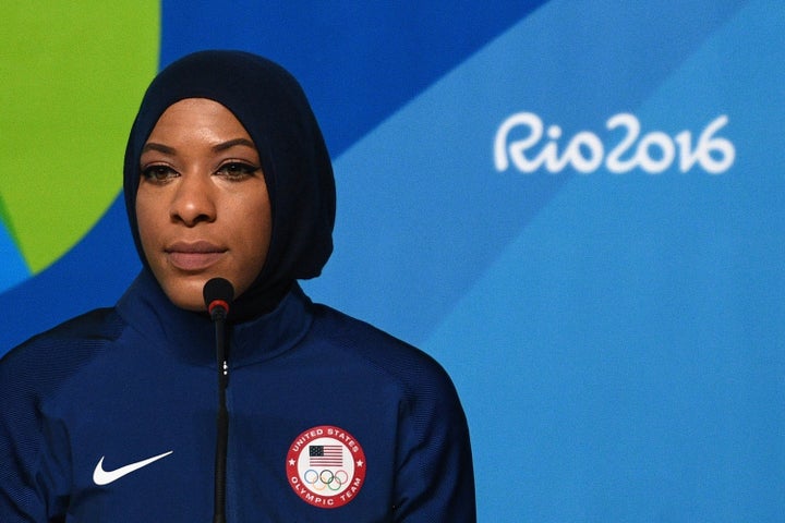 American Olympic fencer Ibtihaj Muhammad faces the media during a press conference.