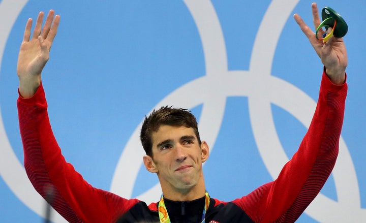 Michael Phelps waves from the podium at the Olympic aquatics stadium on Thursday in Rio de Janeiro, Brazil.