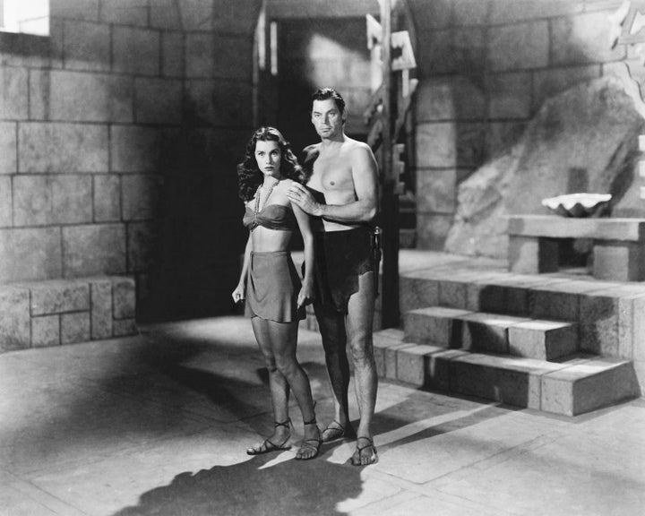 <strong>Johnny Weissmuller (1904 - 1984) as Tarzan, and Brenda Joyce (1917 - 2009) as Jane, in 'Tarzan And The Mermaids'.</strong>