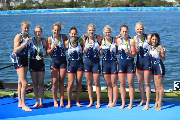 Great Britain's Katie Greves, Melanie Wilson, Frances Houghton, Polly Swann, Jessica Eddie, Olivia Carnegie-Brown, Karen Bennett, Zoe Lee and Zoe de Toledo celebrate with their gold Medals.