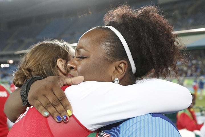 Michelle Carter is congratulated after winning the Women's Shot Put Final during the athletics event at the Rio 2016 Olympic Games.