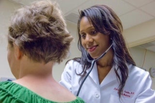 Dr. Caudle seeing a patient in her Sewell, NJ office.