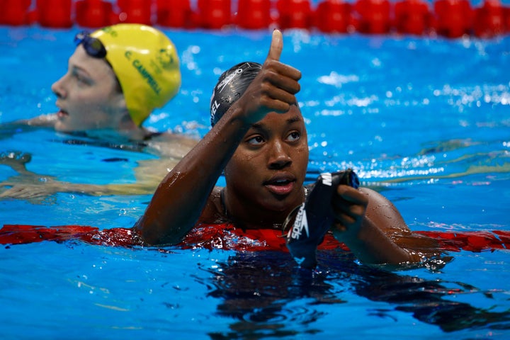 Simone Manuel celebrates in the second Semifinal of the Women's 50m Freestyle on Day 7 of the Rio 2016 Olympic Games on Augus