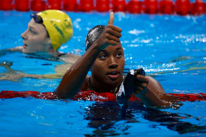Simone Manuel celebrates in the second Semifinal of the Women's 50m Freestyle on Day 7 of the Rio 2016 Olympic Games on August 12, 2016.