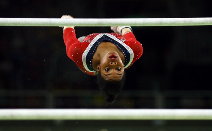 Gabby Douglas competes in the uneven bars final on August 14, 2016 in Rio de Janeiro.