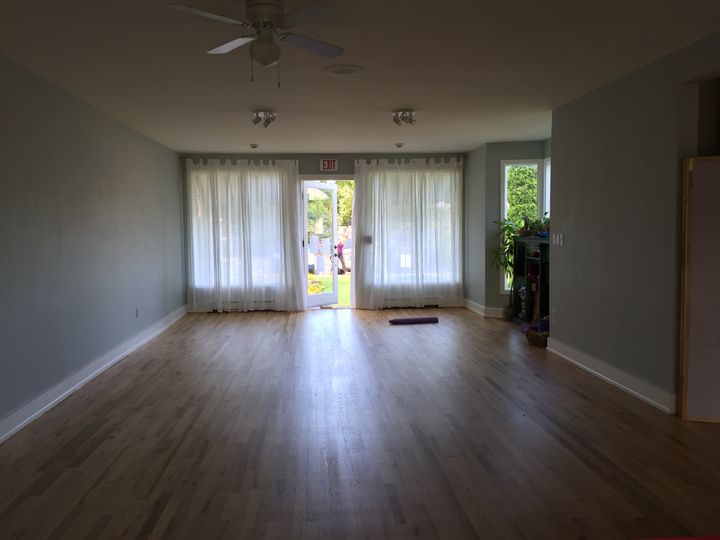 Hamptons Yoga studio with front door open to allow cross ventilation.