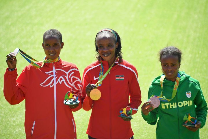 Kirwa (left) and Sumgong (center) were joined on the podium by Ethiopia's Mare Dibaba, who took bronze in the women's marathon at Rio 2016.