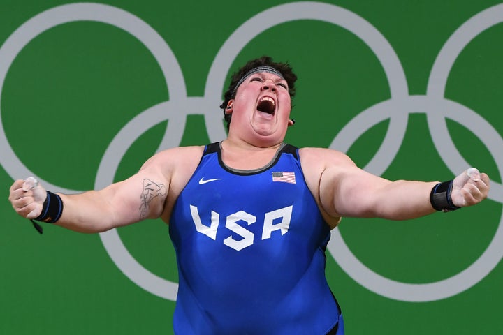 Sarah Elizabeth Robles reacts while competing during the Women's weightlifting +75kg event at the Rio 2016 Olympic Games on August 14, 2016.