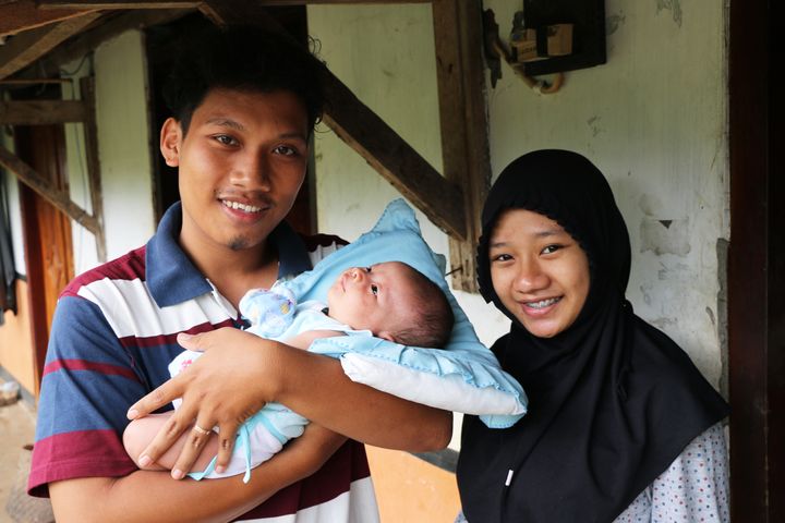 Anggit Bayu Saputro (left), age 21, and Wadianti, age 19, became parents five years before they'd planned. They feared using contraception and had little access to it as an unmarried couple.