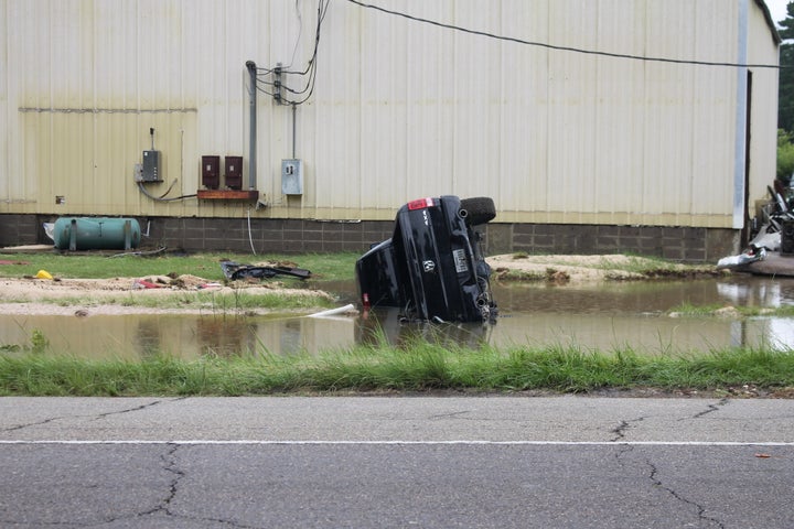 An overturned truck in the floodwaters in Amite, Louisiana.