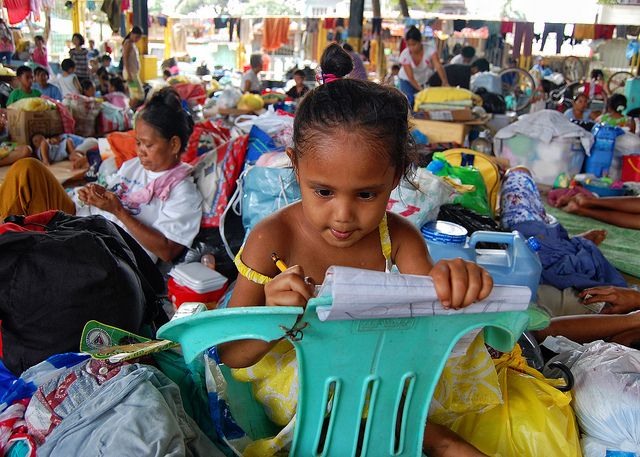 Young girl in an evacuation center, 2009. Philippines.