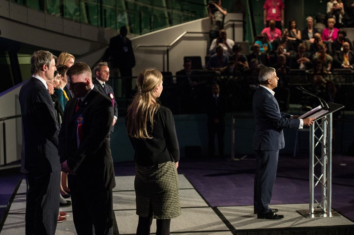 Paul Golding, turns his back Sadiq Khan of the Labour Party makes an acceptance speech as the new Mayor of London at City Hall on May 06.