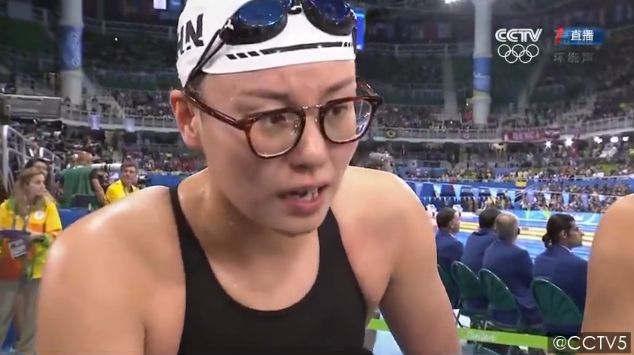 Fu Yuanhui speaks to a reporter after competing in the 4x100-meter medley relay this past Saturday.