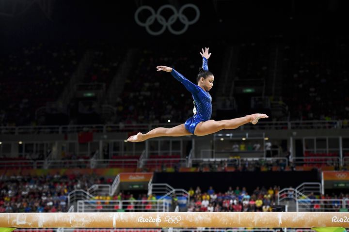 Brazil's Flavia Saraiva soars above the beam during Monday's competition.