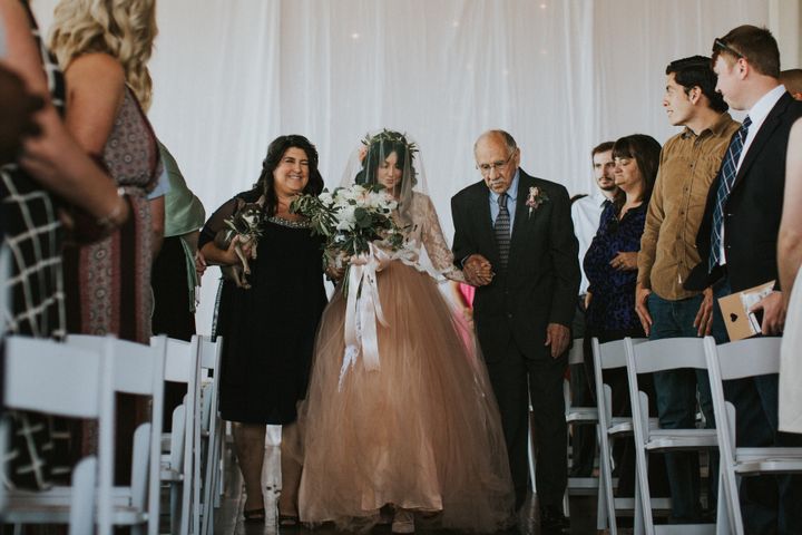 Along with Andy, the bride said her mother has been her biggest supporter through it all. "She has held me and let me cry on her shoulder when I needed a pity party moment and she has celebrated me when I have achieved any goal."