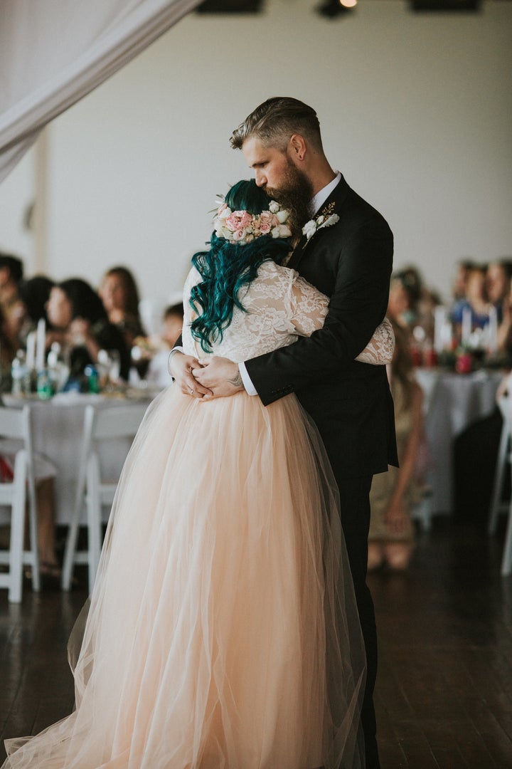Against all odds, the bride and groom shared a dance at the reception.