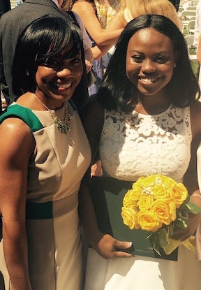 Stacy Hawkins Adams with daughter, on high school graduation day.