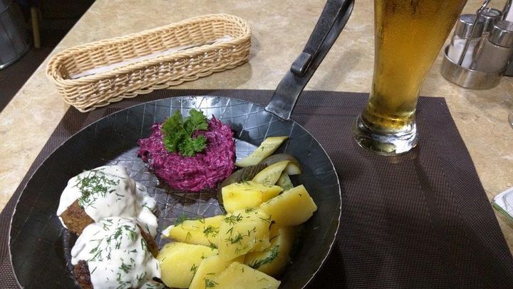 Meal of Konigsberg Klops meatballs, beet salad and potatoes costs under $7