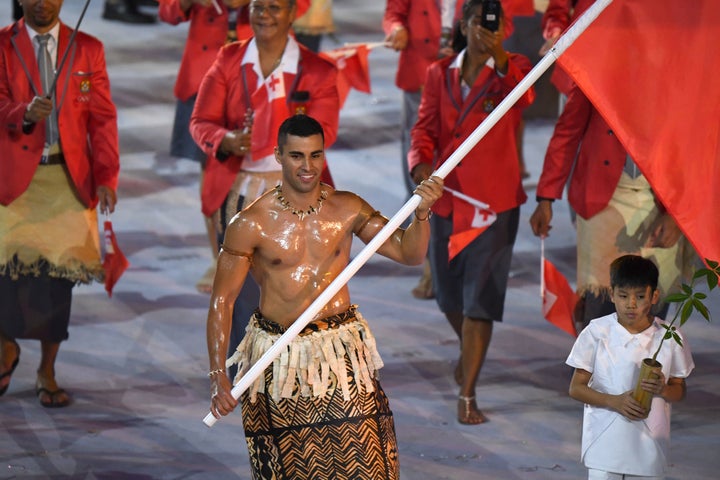 Tonga's flagbearer Pita Nikolas Taufatofua leads his delegation during the opening ceremony of the Rio 2016 Olympic Games at the Maracana stadium in Rio de Janeiro on August 5.