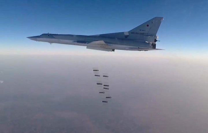A Tupolev Tu-22M3 long-range bomber carries out airstrikes against Islamic State targets in the city of Dayr al-Zawr, eastern Syria, using high-explosive fragmentation weapons.