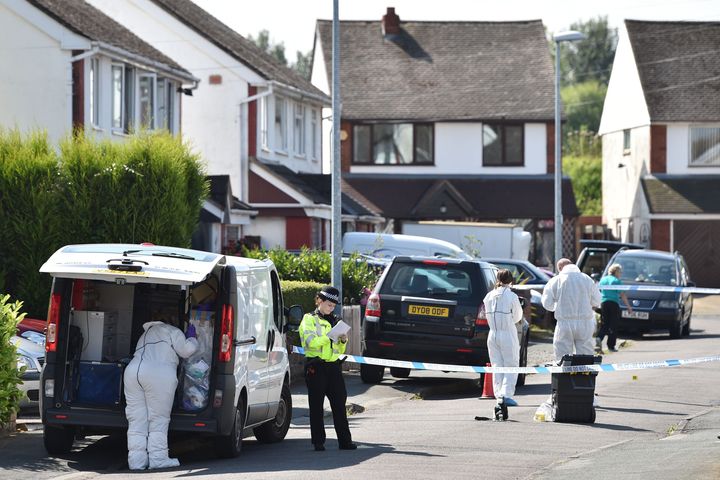 <strong>Officers and forensic teams outside an address in Meadow Close in the Trench area of Telford following the death of Dalian Atkinson.</strong>