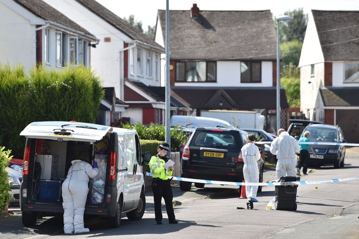 Officers and forensic teams outside an address in Meadow Close in the Trench area of Telford following the death of Dalian Atkinson.