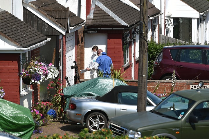 Forensic officers at an address on the street where Dalian Atkinson was tasered by police.