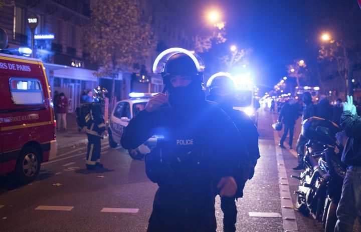 Elite police officers arrive outside the Bataclan theater in Paris, France, in November 2015 
