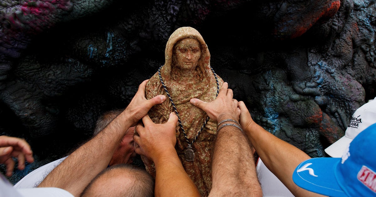 Sunken Virgin Mary Statue Makes Fleeting Appearance Above Ground | HuffPost  Religion