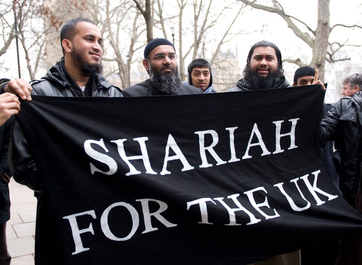 Anjem Choudary (centre) seen with supporters on Millbank in central London