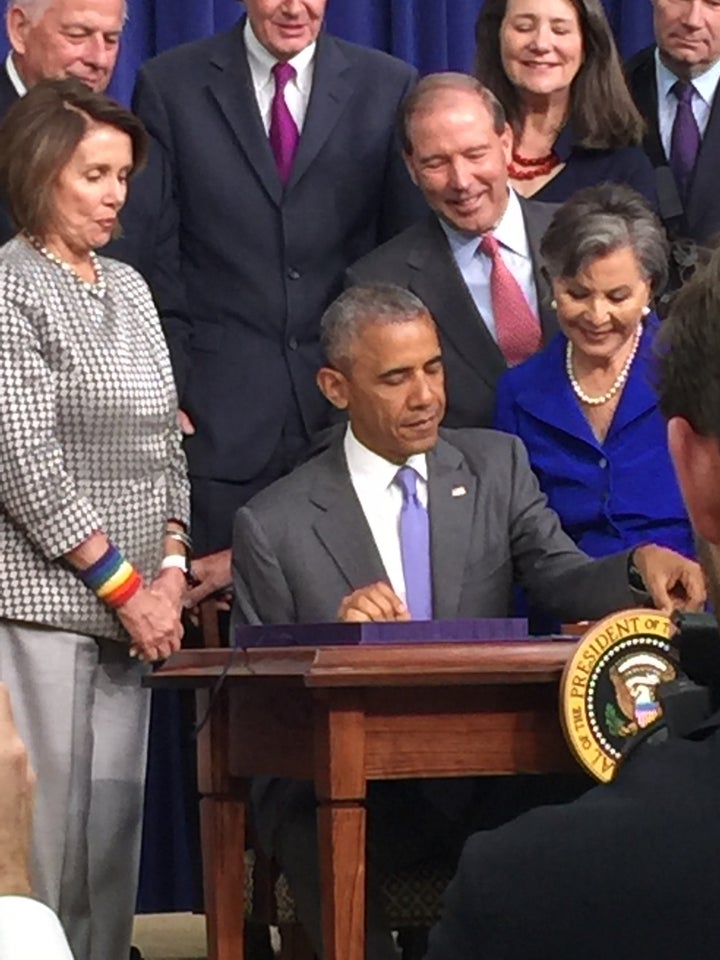 President Obama signing Trevor's Law into action.