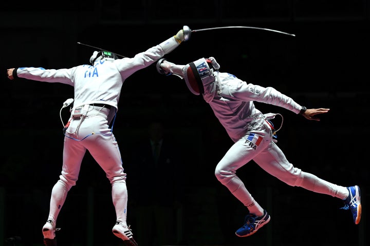 Italy's Paolo Pizzo, left, competes against France's Yannick Borel at the Rio Olympics on August 14, 2016.