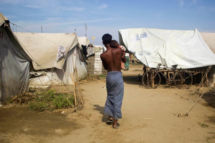 A Rohingya Muslim detained in a Burmese camp what New York Times describes it as the 21st Century Concentration Camps