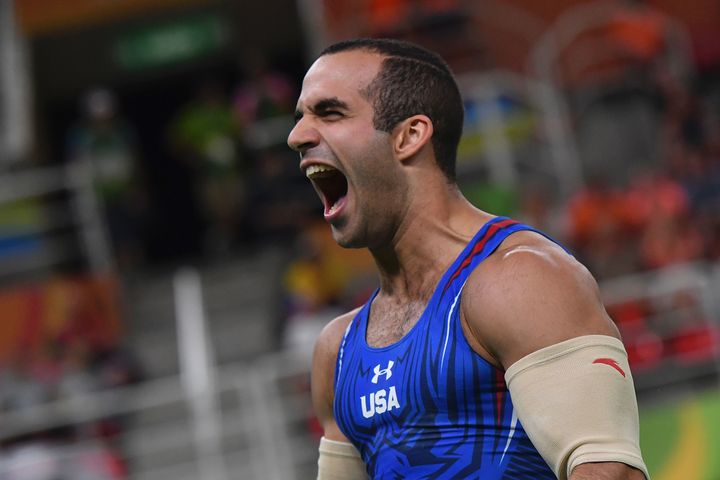U.S. gymnast Danell Leyva reacts after competing in the men's parallel bars event final.