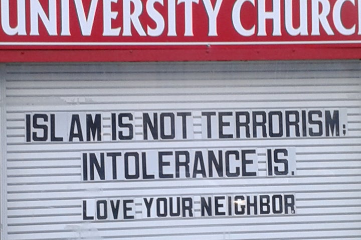 Sign outside of a church in Hyde Park, Chicago, following the November 13, 2015 Paris attacks claimed by ISIS.