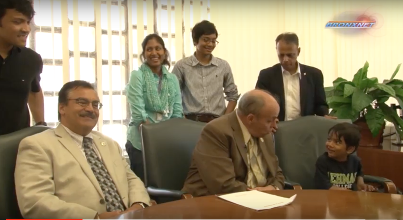 Vice President Jose Magdaleno and Isaac's family members listen to his conversation with President Fernandez.