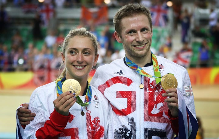 Laura Trott and Jason Kenny pose with their latest medals