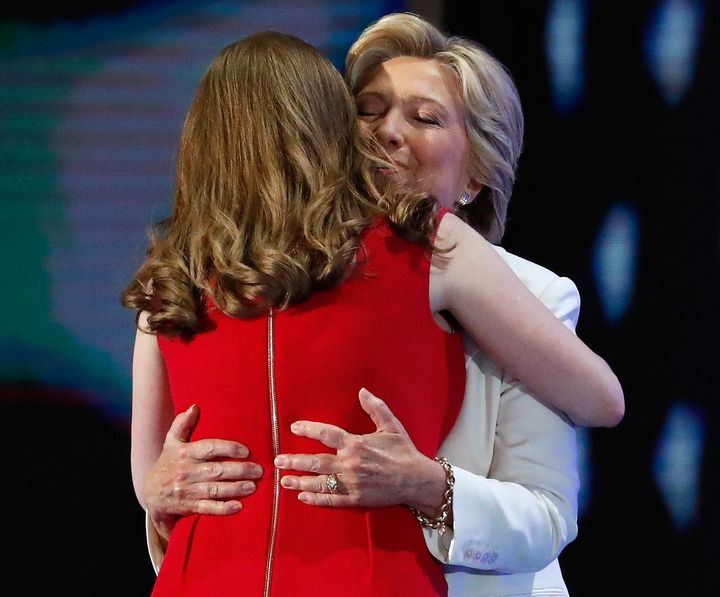 Democratic presidential nominee Hillary Clinton embraces her daughter Chelsea Clinton at the Democratic National Convention at the Wells Fargo Center, July 28, 2016 in Philadelphia, Pennsylvania.