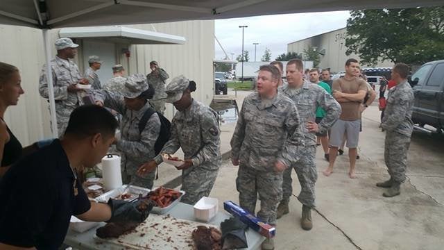 Officers enjoy some of Dornhorsts’ food.